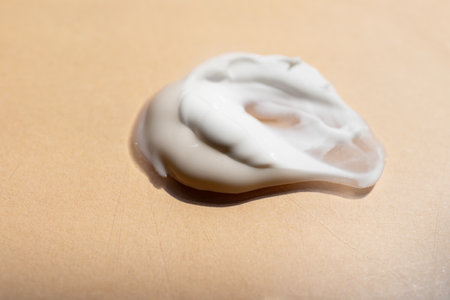 face cream and scrubs on a light background. Smear of cosmetic product on a light backgroundの写真素材
