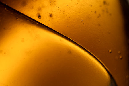 surface of oil or serum with bubbles. Blurred backgroundの写真素材