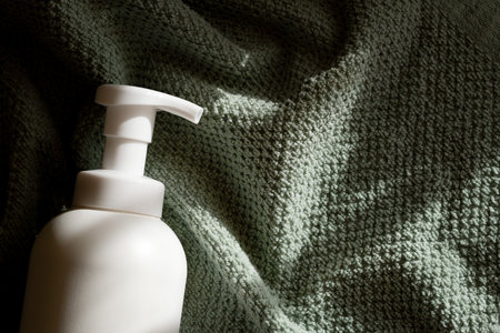 Soap or shower gel on a waffle towel