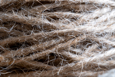 Jute ropes closeup, background texture. thick hemp rope. linen rope-wound.の写真素材
