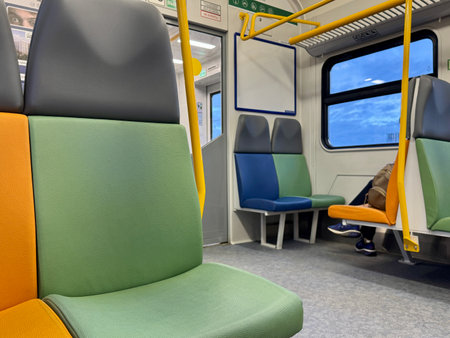 Multi-colored leather seats inside an electric train in the Moscow region. High quality photoの写真素材