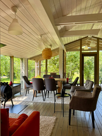 Modern and stylish interior of a country house on a summer day. High quality photoの写真素材