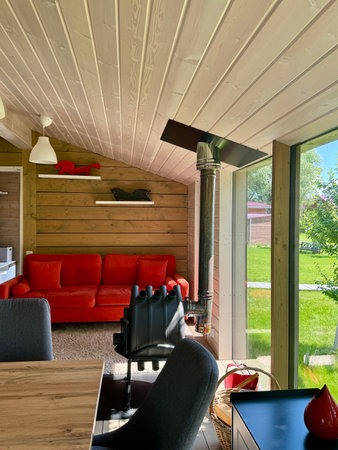 Modern and stylish interior of a country house on a summer day. High quality photoの写真素材