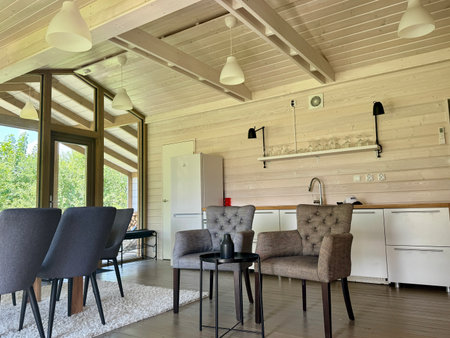 Modern and stylish interior of a country house on a summer day. High quality photoの写真素材