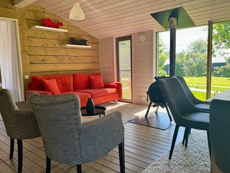 Modern and stylish interior of a country house on a summer day. High quality photoの写真素材