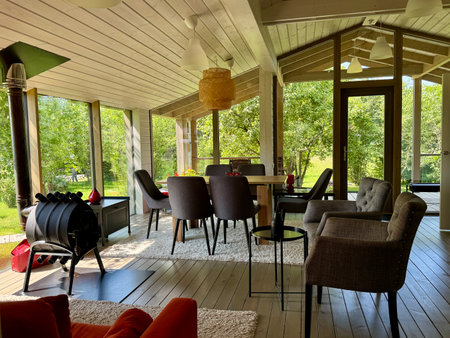 Modern and stylish interior of a country house on a summer day. High quality photoの写真素材
