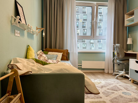 a modern children's room in a stylish interior of a new apartment in bright colors. High quality photoの写真素材