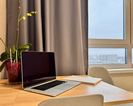 Workplace at home, laptop on the table. High quality photoの写真素材