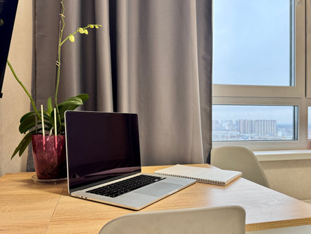 Workplace at home, laptop on the table. High quality photoの写真素材