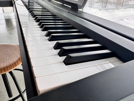 A modern synthesizer for musicians is located indoors. High quality photoの写真素材