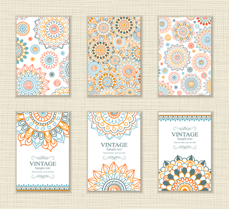 Set of vintage Wedding Invitation card with Mandala pattern and in green, blue and red color.のイラスト素材