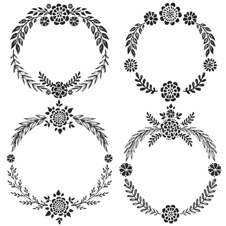 Set of hand drawn floral wreaths with leaves, flowers, berries. Vector round frames. Decorative elements for design in black and white sketch style.のイラスト素材