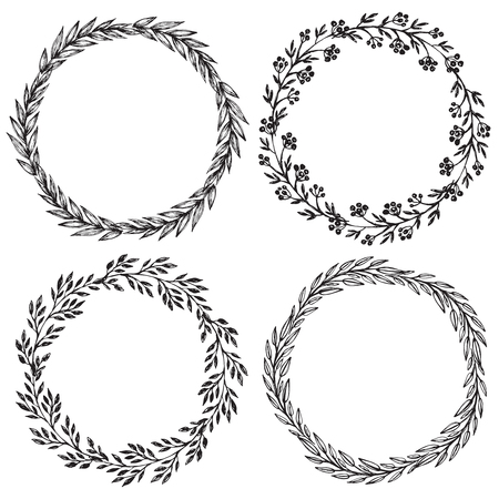 Set of hand drawn vector floral wreaths with leaves, flowers, berries.のイラスト素材