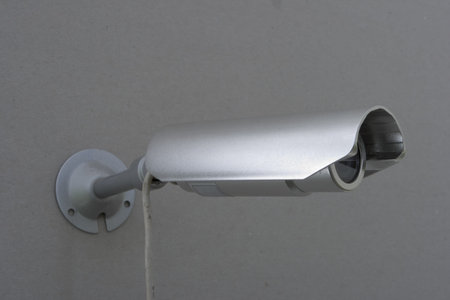 video camera of the spying and record bolted on wall
