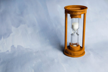 Hourglass on a light background