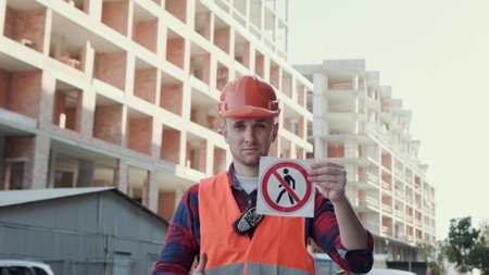 Foreman warning people against entering development siteの写真素材