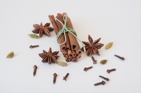 Set of cinnamon, clove and star anise on white background. Close upの写真素材
