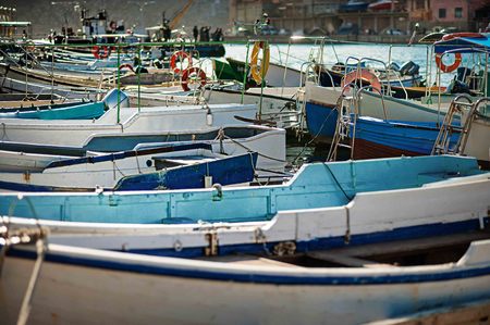 Group of small fishing boats working row-boats with fishing paraphernalia etcの写真素材