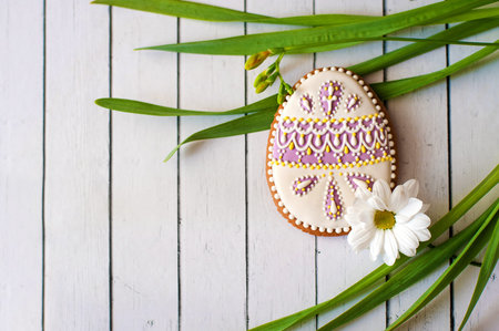Palm Sunday. Easter egg gingerbread and spring grass