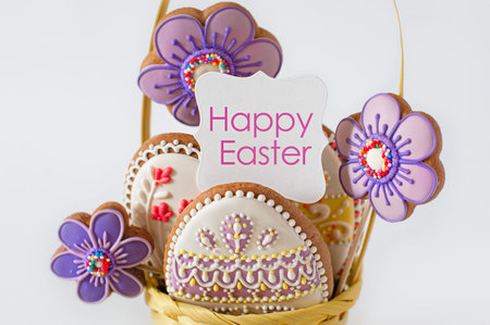 Closeup of wicker basket with tasty Easter cookies