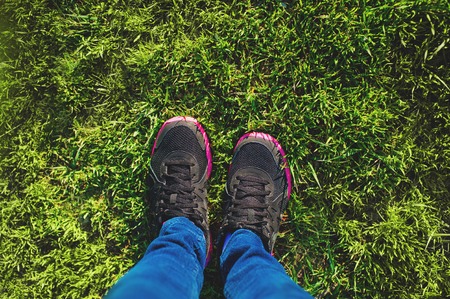 Healthy lifestyle runner girl running shoes selfie. Healthy lifestyle sporty female athlete.の写真素材