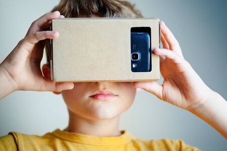 Child with virtual reality headset. Close up portraitの写真素材