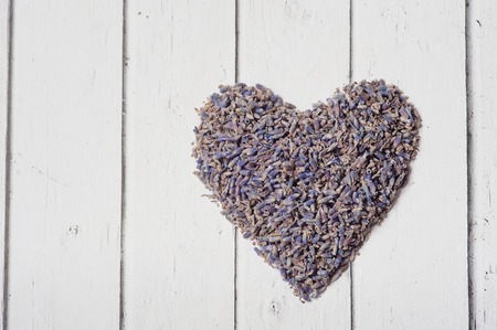 dry lavender in a heart shape designの写真素材