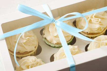 sweet present. gift box with cupcakesの写真素材