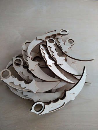 Wooden toys made by laser cutting from wood waste.のeditorial素材