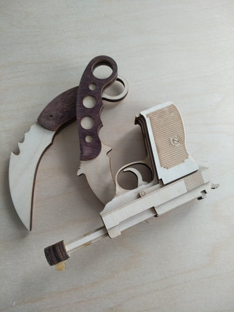 Wooden toys made by laser cutting from wood waste.