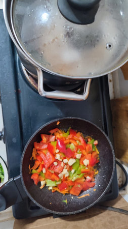 cooking vegetable soup at home, pot, lunch food. high quality photoの写真素材