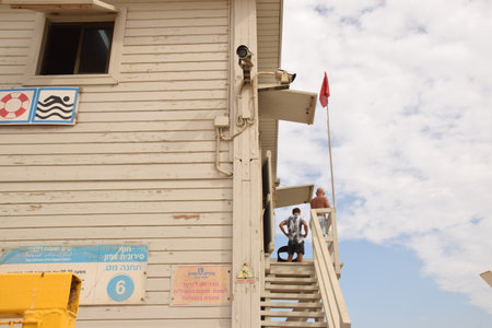 20 June 2023 Netanya Israel, beach blue sky , buildingのeditorial素材