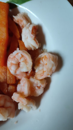 food boiled eggs, shrimp and sweet potato plate, lunch dinner cooking breakfast. High quality photoの写真素材