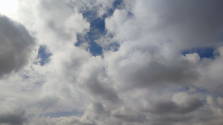 Blue gray light sky nature white clouds whether background. High quality photoの写真素材