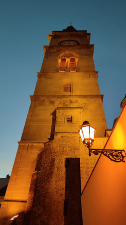 old buildings, church architecture city in the evening at sunset, ancient street, religion October 22 2024 Hradec Kralove Czech Republic Europe Kralov region, Kralovehradecky kraj. High quality photoの写真素材