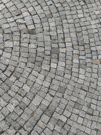gray stone pedestrian tile bars construction background material. High quality photoの写真素材