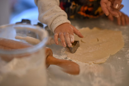 happy family in kitchen. family knead dough and bake the bakery together in kitchen.