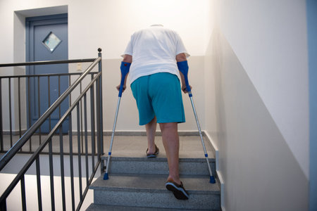 A disabled person takes out garbageの写真素材