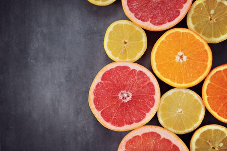 Citrus. Delicious lemon and grapefruit on the tableの写真素材
