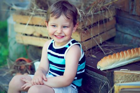 Adorable kid on the farmの写真素材