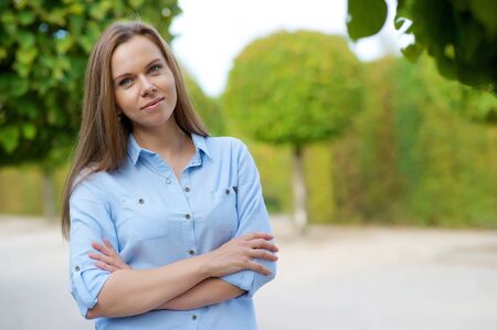 Beautiful woman in the parkの写真素材