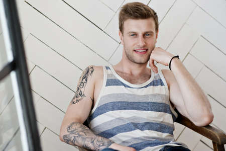 Lifestyle. Handsome guy at homeの写真素材