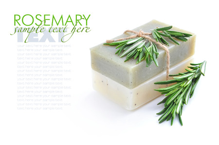 Rosemary Handmade Soap with the branches of rosemary on a white backgroundの写真素材