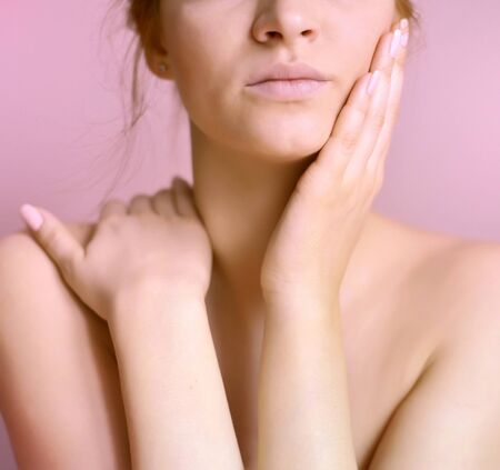 Young beautiful woman. Focus is on a handの写真素材