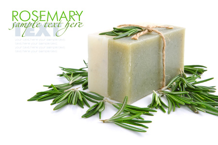 Rosemary Handmade Soap with the branches of rosemary on a white backgroundの写真素材