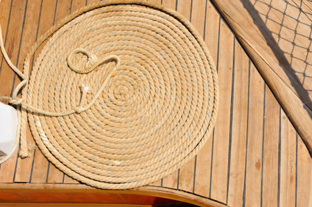 Ship ropes on a wooden boat deck