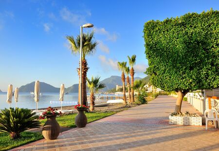 Seafront against the backdrop of the picturesque bay of blue sea and mountains. Marmaris. Turkeyの写真素材