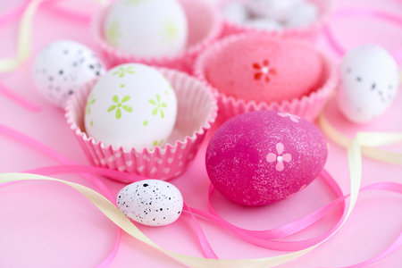 Festive background with easter eggs and ribbonsの写真素材