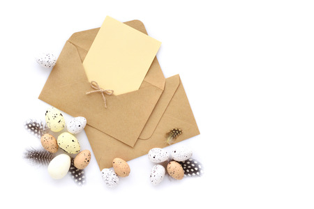 Festive easter background with eggs with envelopes for your greetings. Top viewの写真素材