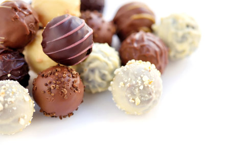 Close-up Assorted of chocolate candies on white background. Selective focus